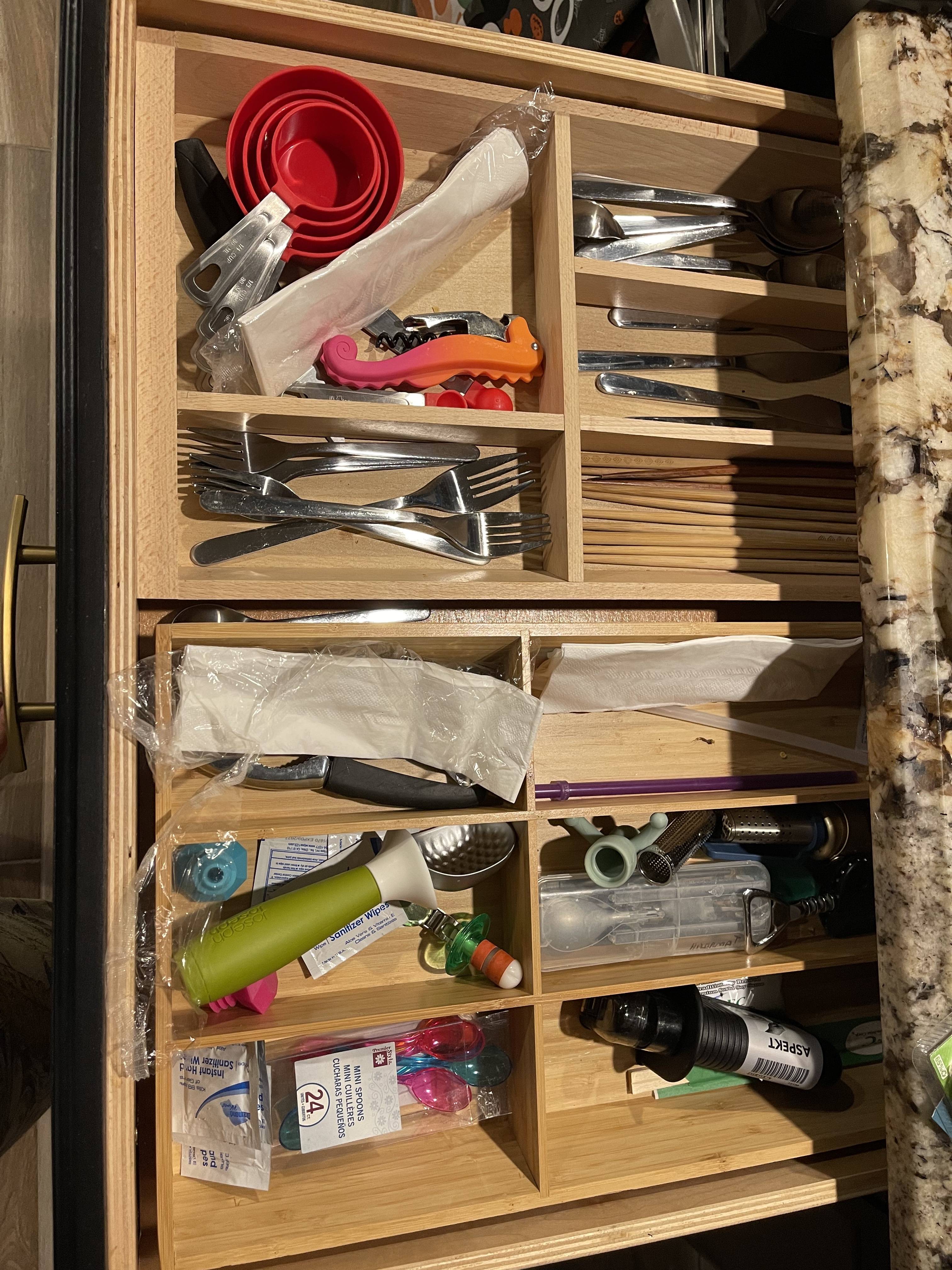 Current drawer. Shows a very messy drawer with mismatched wood drawer inserts and utensils not quite fitting inside. This will change for the ORC