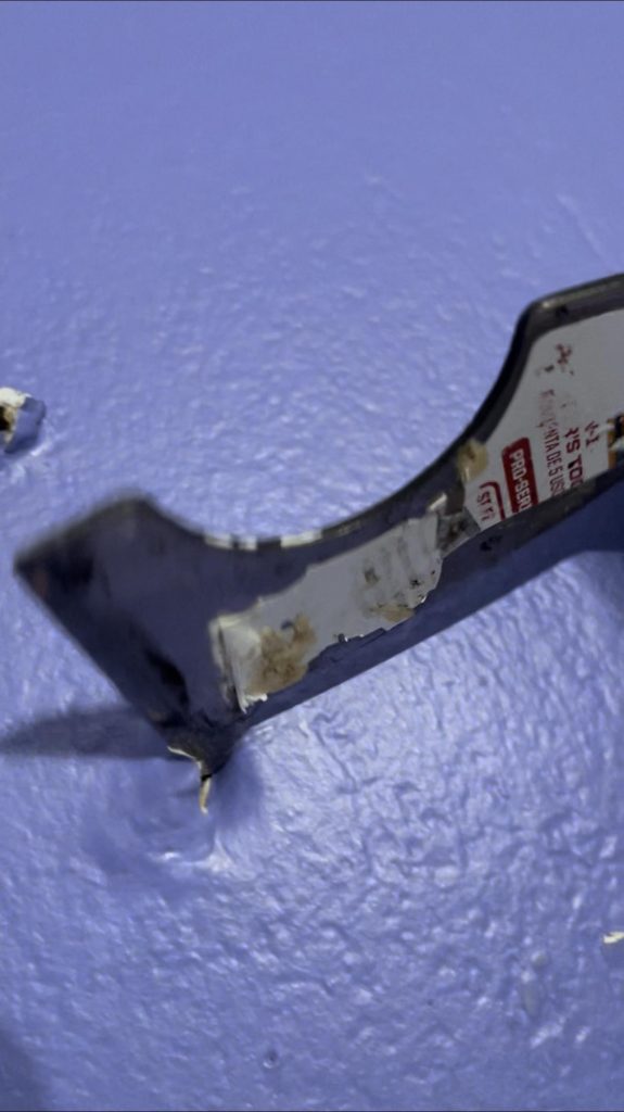 Image of 5 in 1 paint scraper and a bad patch