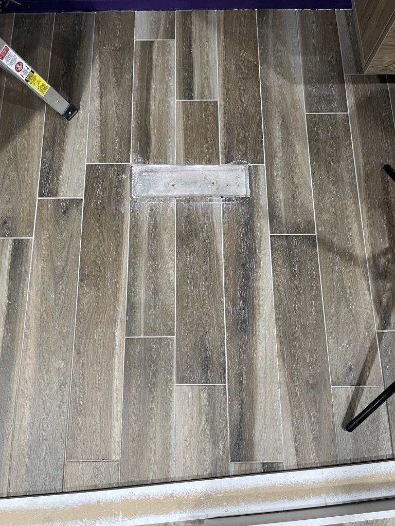 Image of Closet wall Floor showing a small hole where the wall used to be