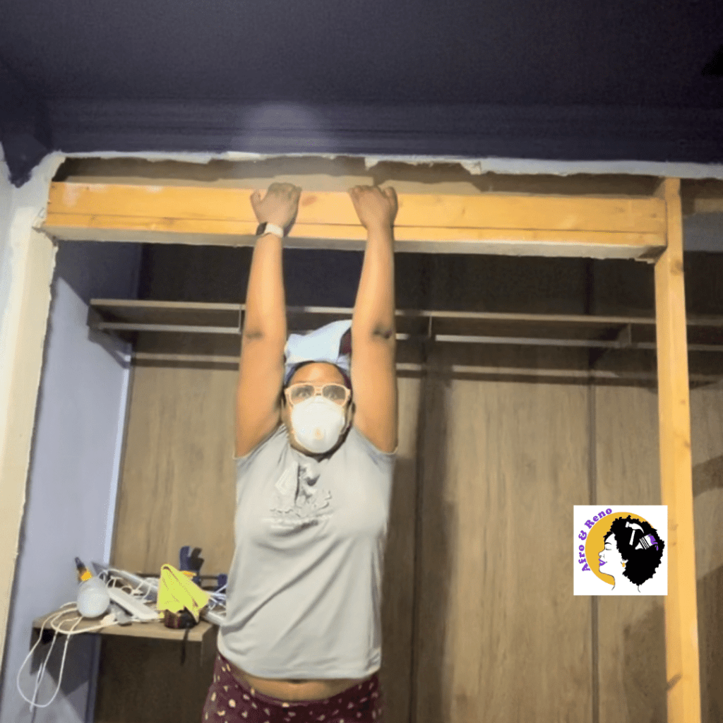 Afro and Reno Hanging on the the Closet header. Showing off how sturdy it is